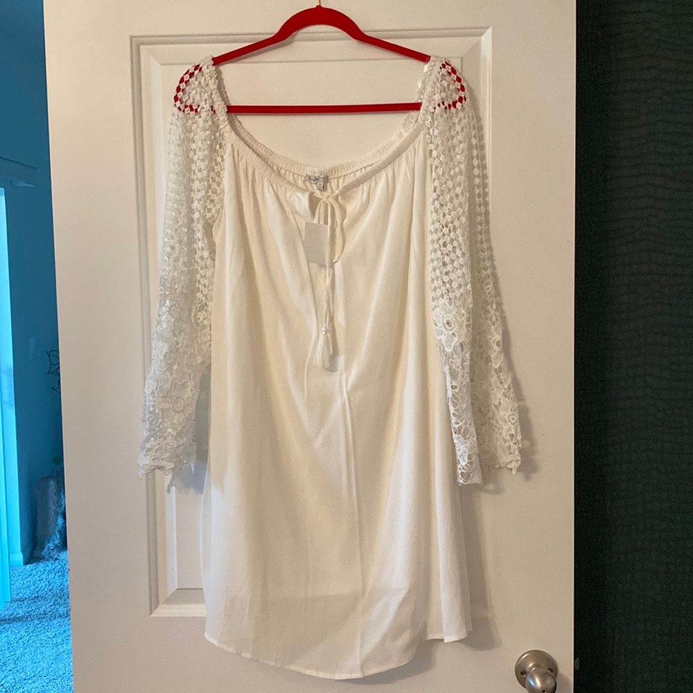 Knee length dress light weight can be worn on or off shoulders crochet sleeves